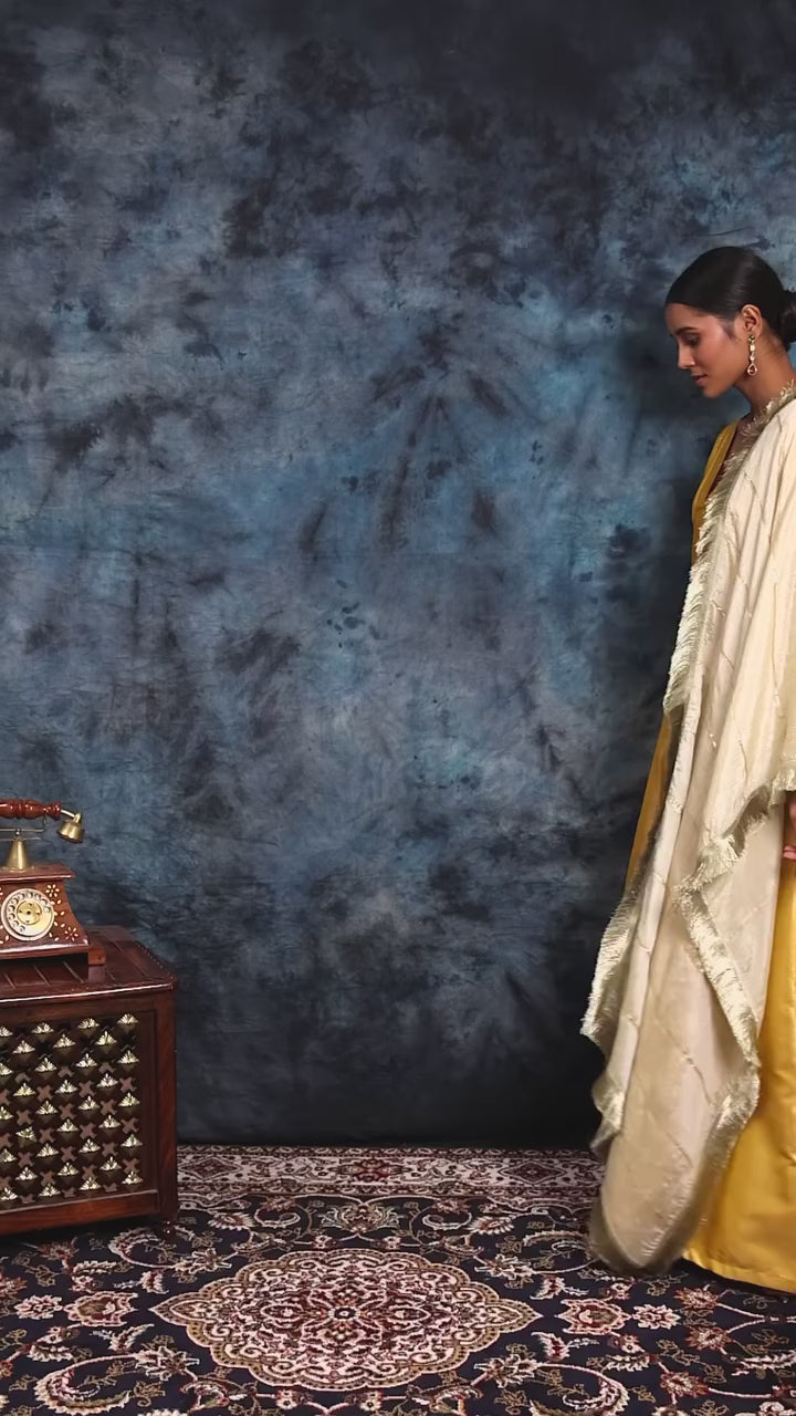 Load video: The golden hour collection for the wedding season with straight cut kurta sets in bright colors of silk brocade and elegant dupatta.